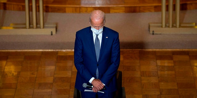 TOPSHOT - Democratic presidential candidate and former US Vice President Joe Biden prays at Grace Lutheran Church in Kenosha, Wisconsin, on September 3, 2020, in the aftermath of the police shooting of Jacob Blake. (Photo by JIM WATSON / AFP) (Photo by JIM WATSON/AFP via Getty Images)
