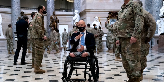 Rep. Brian Mast, R-Fla., gives members of the National Guard a tour of the U.S. Capitol on Jan. 13, 2021, in Washington, D.C. 