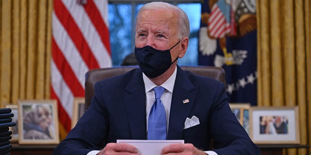 US President Joe Biden is preparing to sign a series of orders in the Oval Office of the White House in Washington, DC, after being sworn in at the US Capitol on January 20, 2021.  The party leaders in the Senate are struggling to reach a power-sharing agreement, something that could harm Biden's agenda if it is not dealt with quickly.  (Photo by Jim WATSON / AFP) (Photo by JIM WATSON / AFP via Getty Images)