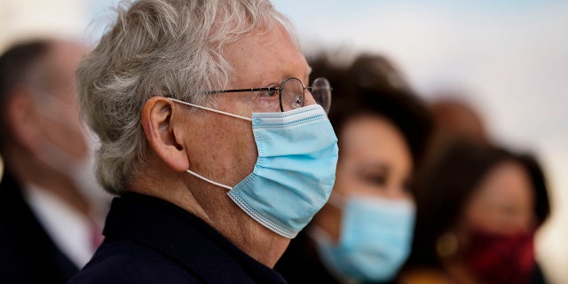 Sen. Mitch McConnell (R-KY) and former Secretary of Transportation Elaine Chao depart after the inauguration of President Joe Biden on January 20, 2021 in Washington, DC. (Photo by Melina Mara - Pool/Getty Images)