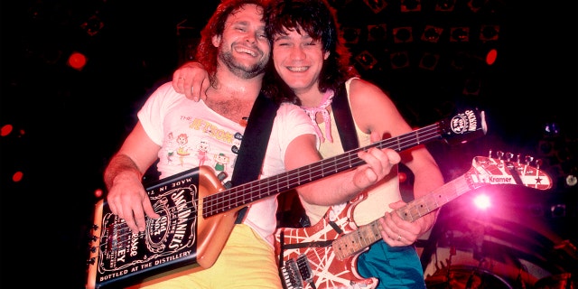 Rock musicians Michael Anthony and Eddie Van Halen (1955 - 2020), both of the group Van Halen, performing onstage at the Rosemont Horizon, Rosemont, Illinois, March 15, 1986.