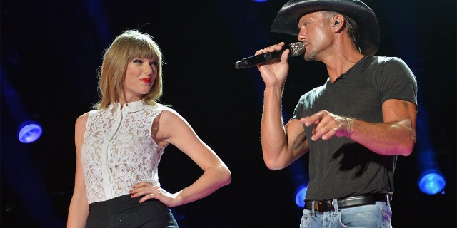 Singers Taylor Swift and Tim McGraw perform during the 2013 CMA Music Festival on June 6, 2013, in Nashville, Tennessee.