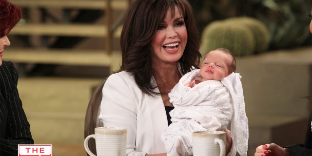 Guest co-host and new grandmother Marie Osmond debuts the latest addition to her family, a grandson, on 'The Talk.'