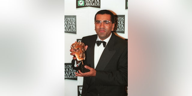 Television journalist Martin Bashir with the BAFTA Award he received for his interview with Princess Diana. 