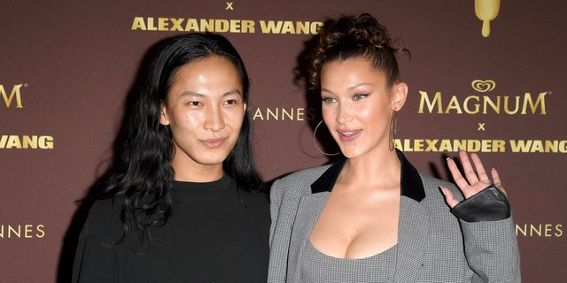 Alexander Wang and model Bella Hadid attend the Magnum VIP party during the 71st annual Cannes Film Festival at Magnum Beach in May 2018 in Cannes, France. (Venturelli/WireImage)