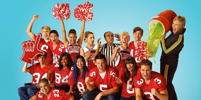 Naya Rivera (raised hands) starred in all six seasons of 'Glee.' (Photo by FOX Image Collection via Getty Images)