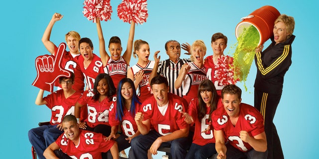 Naya Rivera (raised hands) starred in all six seasons of 'Glee.' (Photo by FOX Image Collection via Getty Images)