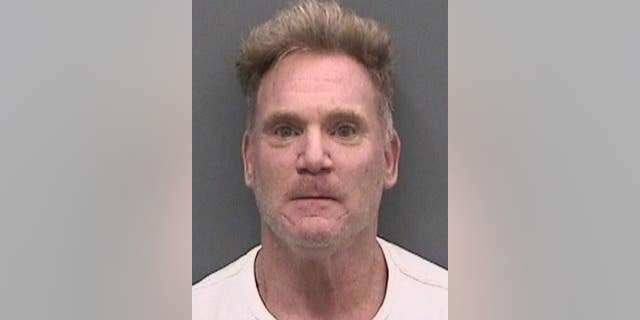 Scott Anthony Massa, 51, allegedly chucked a bucket full of accelerant into the home, which ignited