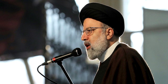 Ebrahim Raisi, head of the Iranian judiciary, speaks at a ceremony commemorating the first anniversary of the death of the late Iranian Revolutionary Guards Corps (IRGC) General and Commander of the Quds Force Qasem Soleimani, in Tehran, Iran, on Friday 1 January.  2021. (Associated Press)