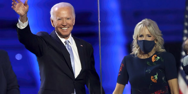 Then President-elect Joe Biden and Jill Biden wave to the crowd after Biden's address to the nation from the Chase Center November 07, 2020 in Wilmington, Delaware. (Photo by Tasos Katopodis/Getty Images)