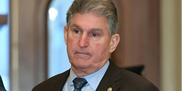 Senator Joe Manchin arrives for the impeachment trial of President Trump on Capitol Hill Jan. 30, 2020, in Washington, D.C.