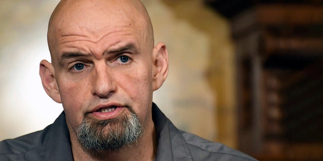 FILE - In this file photo from Jan. 24, 2019, Pennsylvania Lt. Gov. John Fetterman speaks at a press conference in the Capitol Governor's Reception Room in Harrisburg, Pa.  Fetterman is running for the open seat of the US Senate in 2022 (AP Photo / Marc Levy, file)