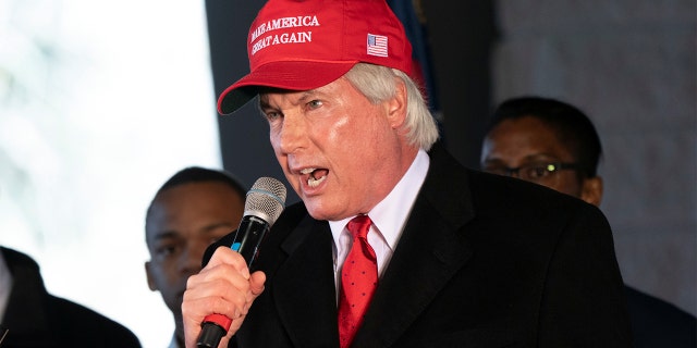 Attorney L. Lin Wood speaks during an election results press conference in Alpharetta, Ga., Dec. 2, 2020. REUTERS / Elijah Nouvelage - RC2AFK9OXUW5