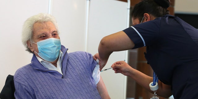 Entertainer Lionel Blair, age 92, received his vaccine in Britain.