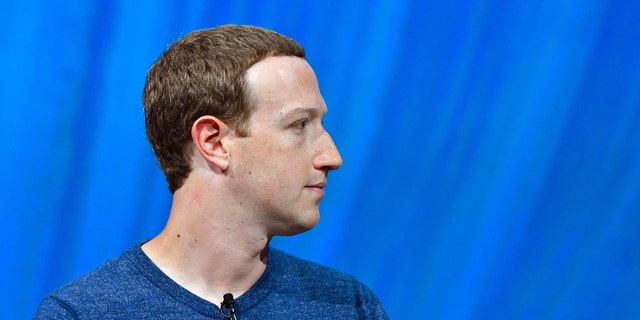 TOPSHOT - Facebook's CEO Mark Zuckerberg looks on during the VivaTech (Viva Technology) trade fair in Paris, on May 24, 2018. (Photo by GERARD JULIEN / AFP)