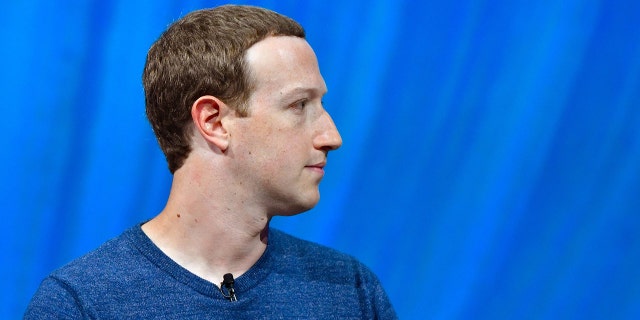 TOPSHOT - Facebook's CEO Mark Zuckerberg looks on during the VivaTech (Viva Technology) trade fair in Paris, on May 24, 2018. 