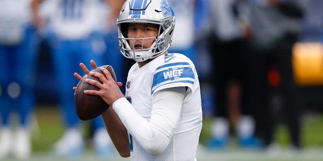 FILE - In this Dec. 20, 2020, file photo, Detroit Lions quarterback Matthew Stafford looks to past against the Tennessee Titans during the first half of an NFL football game in Nashville, Tenn. (AP Photo/Wade Payne, File)