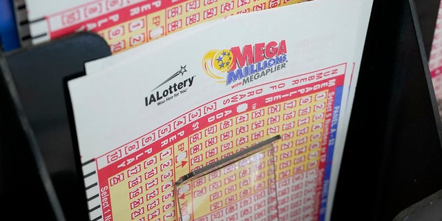 Forms for the Mega Millions lottery at a local grocery store on January 12, 2021 in Des Moines, Iowa.  (Associated Press)