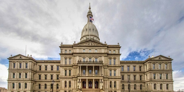 Campus and front entrance to the Michigan state capitol building in downtown Lansing.