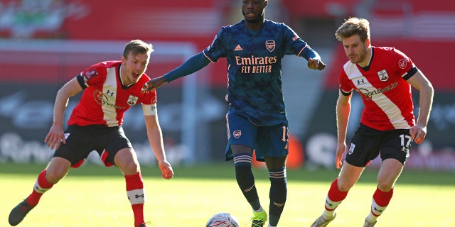 BBC apologizes for live sex pranks during football match 3 Arsenal's Nicolas Pepe, center, with Southampton's James Ward-Prowse, left, and Stuart Armstrong during the Emirates FA Cup fourth round match at St. Mary's Stadium in Southampton, England, Saturday, Jan. 23, 2021. (Catherine) is fighting for the ball. AP via Ivill/PA)