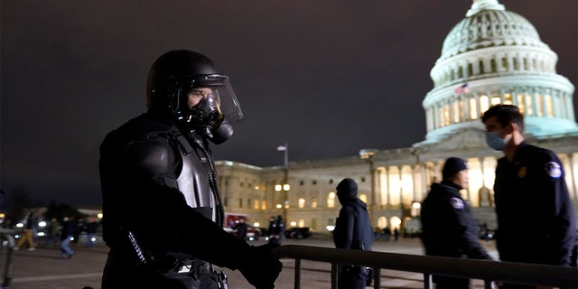 Authorities secure the area outside the U.S. Capitol, Wednesday, Jan. 6, 2021, in Washington. (AP Photo/Jacquelyn Martin)