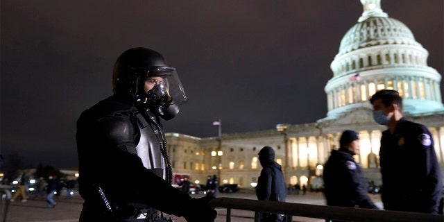 Authorities secure the area outside the U.S. Capitol, Wednesday, Jan. 6, 2021, in Washington. (AP Photo/Jacquelyn Martin)