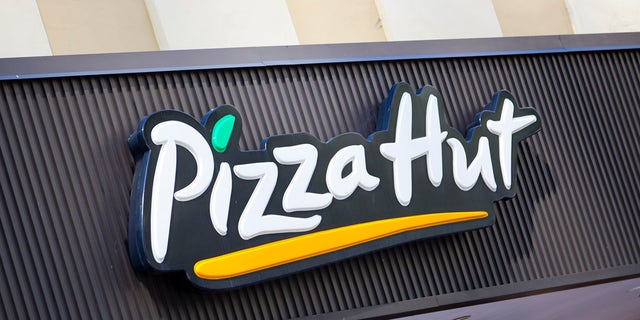 Miami, Florida, USA - March 19, 2011: the Pizza Hut store sign located in downtown Miami.