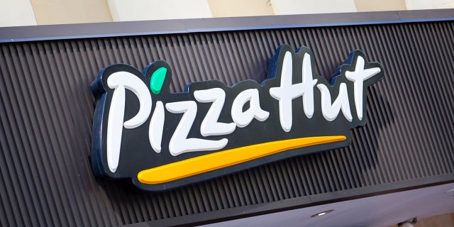 Miami, Florida, USA - March 19, 2011: the Pizza Hut store sign located in downtown Miami.