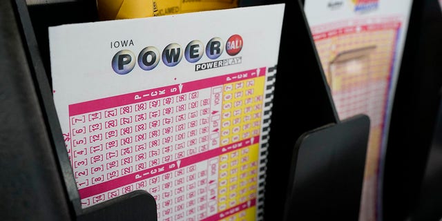 The Powerball jackpot rose to $ 640 million ahead of its next draw on Saturday, while the Mega Millions jackpot climbed to $ 750 million ahead of Friday night's draw.  (AP Photo / Charlie Neibergall)