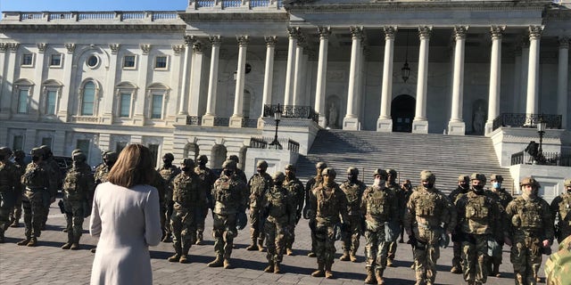 Democratic House Speaker Nancy Pelosi (Daniel) speaks to National Guard troops in front of the US Capitol. (Source: Ali Ladd of Fox News)