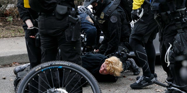 Black Block, anarchists and anti-fascist activists opposed to Joe Biden marched and demonstrated in Portland, Oregon on inauguration day, Jan.20, 2021, resulting in a few broken windows and eight arrests.  (Photo by John Rudoff / Sipa USA)