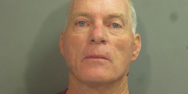 Richard Barnett, 60, allegedly broke into House Speaker Nancy Pelosi's office during a riot inside the U.S. Capitol on Wednesday. (- Washington County, Arkansas)