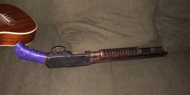 Police said one of the suspects was armed with a shotgun, seen here.