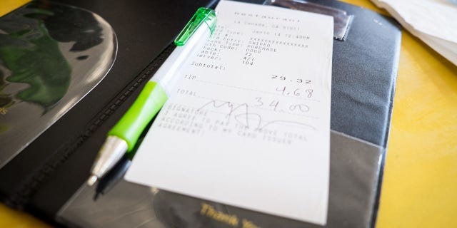 A customer at a Colorado cafe left a $1,400 tip on a $20 meal to be split among the cafe's seven workers. (iStock)