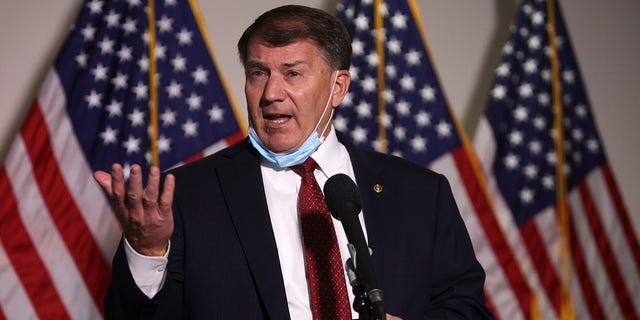 WASHINGTON, DC - NOVEMBER 18:  U.S. Sen. Michael Rounds (R-SD) speaks to members of the press as he arrives at a Senate Republican policy luncheon at the Hart Senate Office Building November 18, 2020 on Capitol Hill in Washington, DC. Senate GOP members held a policy luncheon to discuss the Republican agenda. Rounds had to miss a vote on the Jan. 6 commission on May 28, 2021, due to work travel overseas, his spokesperson said.  (Photo by Alex Wong/Getty Images)