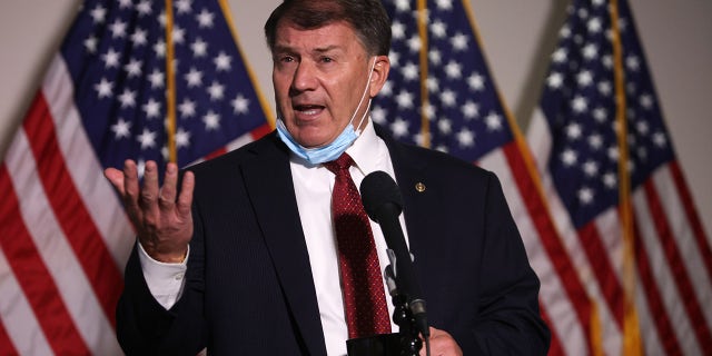 WASHINGTON, DC - NOVEMBER 18: U.S. Sen. Michael Rounds (R-SD) speaks to members of the press as he arrives at a Senate Republican policy luncheon at the Hart Senate Office Building November 18, 2020 on Capitol Hill in Washington, DC. Senate GOP members held a policy luncheon to discuss the Republican agenda. Rounds had to miss a vote on the Jan. 6 commission on May 28, 2021, due to work travel overseas, his spokesperson said. (Photo by Alex Wong/Getty Images)