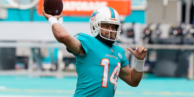 Miami Dolphins quarterback Ryan Fitzpatrick warms up against the Cincinnati Bengals in Miami Gardens, Florida, on Dec. 6, 2020.