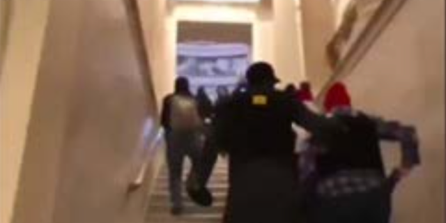 Police say this image depicts Lisa Eisenhart and Eric Munchel inside the Capitol building.
