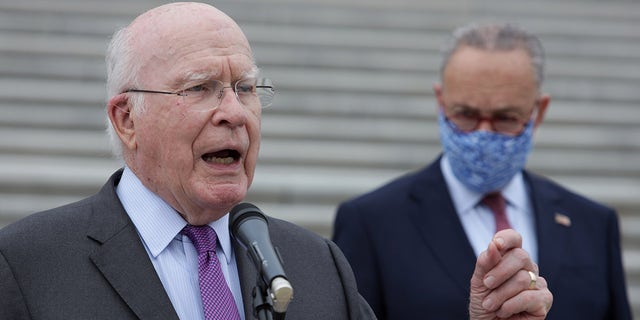 WASHINGTON, DC - OCTOBER 22: U.S. Sen. Patrick Leahy (D-VT) speaks as Senate Minority Leader Sen. Chuck Schumer (D-NY) listens during a news conference in front of the U.S. Capitol after a boycott of the Senate Judiciary Committee hearing on the nomination of Judge Amy Coney Barrett to the U.S. Supreme Court on October 22, 2020 in Washington, DC. (Photo by Alex Wong/Getty Images)