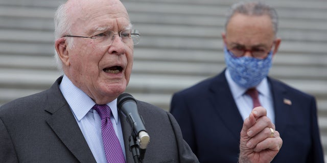 WASHINGTON, DC - OCTOBER 22: U.S. Sen. Patrick Leahy (D-VT) speaks as Senate Minority Leader Sen. Chuck Schumer (D-NY) listens during a news conference in front of the U.S. Capitol after a boycott of the Senate Judiciary Committee hearing on the nomination of Judge Amy Coney Barrett to the U.S. Supreme Court on October 22, 2020 in Washington, DC. (Photo by Alex Wong/Getty Images)