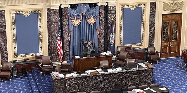 At least one protester reached the dais on the Senate floor, where he reportedly shouted, "Trump won that election."