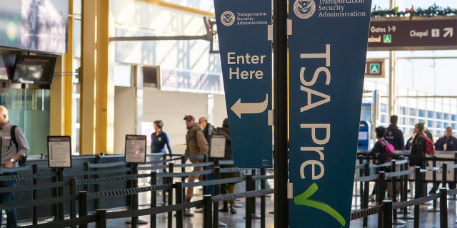 Gutfeld Asks Disney: How Can You Dream When You're Awake? 2 TSA pre-checks the fast lane line before security at Reagan National Airport.