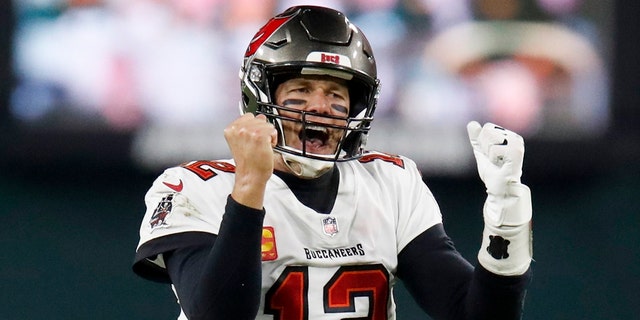 Tampa Bay Buccaneers quarterback Tom Brady reacts after winning the NFC championship NFL football game against the Green Bay Packers in Green Bay, Wis., Sunday, Jan. 24, 2021. (Associated Press)