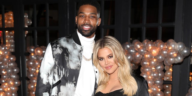 Tristan Thompson and Khloe Kardashian pose for a photo as Remy Martin celebrates Tristan Thompson's Birthday at Beauty & Essex on March 10, 2018 in Los Angeles, California. 