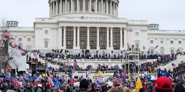 Trump supporters gather outside the Capitol, Wednesday, Jan. 6, 2021, in Washington.