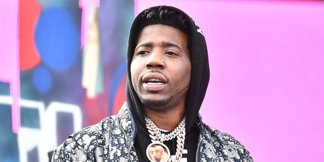 Rapper YFN Lucci is wanted on multiple charges for his alleged role in a shooting in Atlanta last month that left one dead and another wounded. (Photo by Paras Griffin/Getty Images)