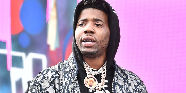 Rapper YFN Lucci is wanted on multiple charges for his alleged role in a shooting in Atlanta last month that left one dead and another wounded. (Photo by Paras Griffin/Getty Images)