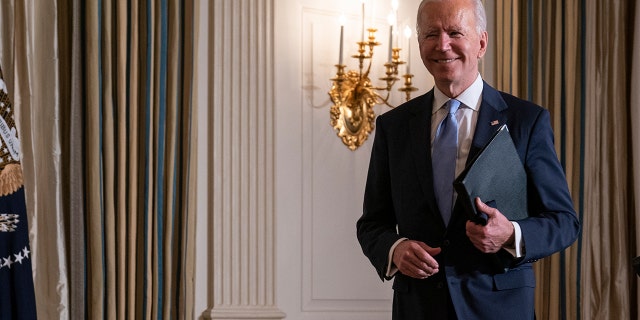 President Joe Biden leaves after attending a virtual swearing in ceremony of political appointees from the State Dining Room of the White House on Wednesday, Jan. 20, 2021, in Washington. (AP Photo/Evan Vucci)