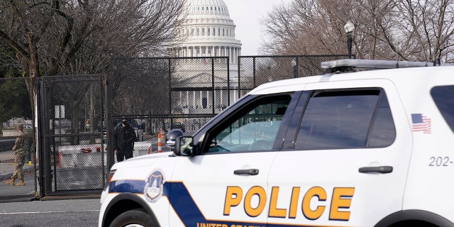 Security surrounds the U.S. Capitol in Washington, Jan. 15, 2021, ahead of the inauguration of President-elect Joe Biden.