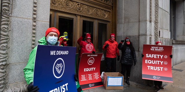 Chicago Teachers Union leadership list their demands and leave a box of coal outside the entrance of City Hall following a car caravan where teachers and supporters demanded a safe and equitable return to in-person learning during the COVID-19 pandemic in Chicago on Dec. 12, 2020. (Photo by Max Herman/NurPhoto via Getty Images)